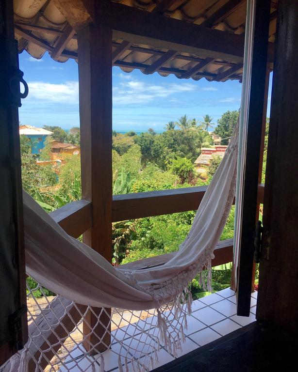 Novos Baianos Hostel E Pousada بورتو سيغورو المظهر الخارجي الصورة Hammock in a hotel in San Juan del Sur, Nicaragua