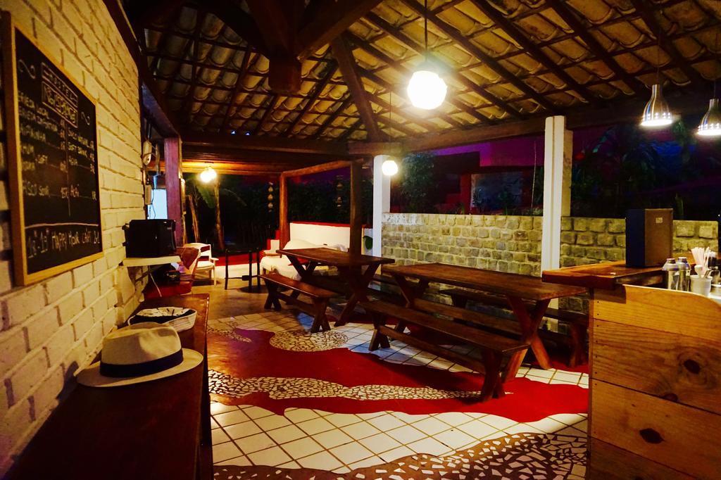 Novos Baianos Hostel E Pousada بورتو سيغورو المظهر الخارجي الصورة The interior of the restaurant
